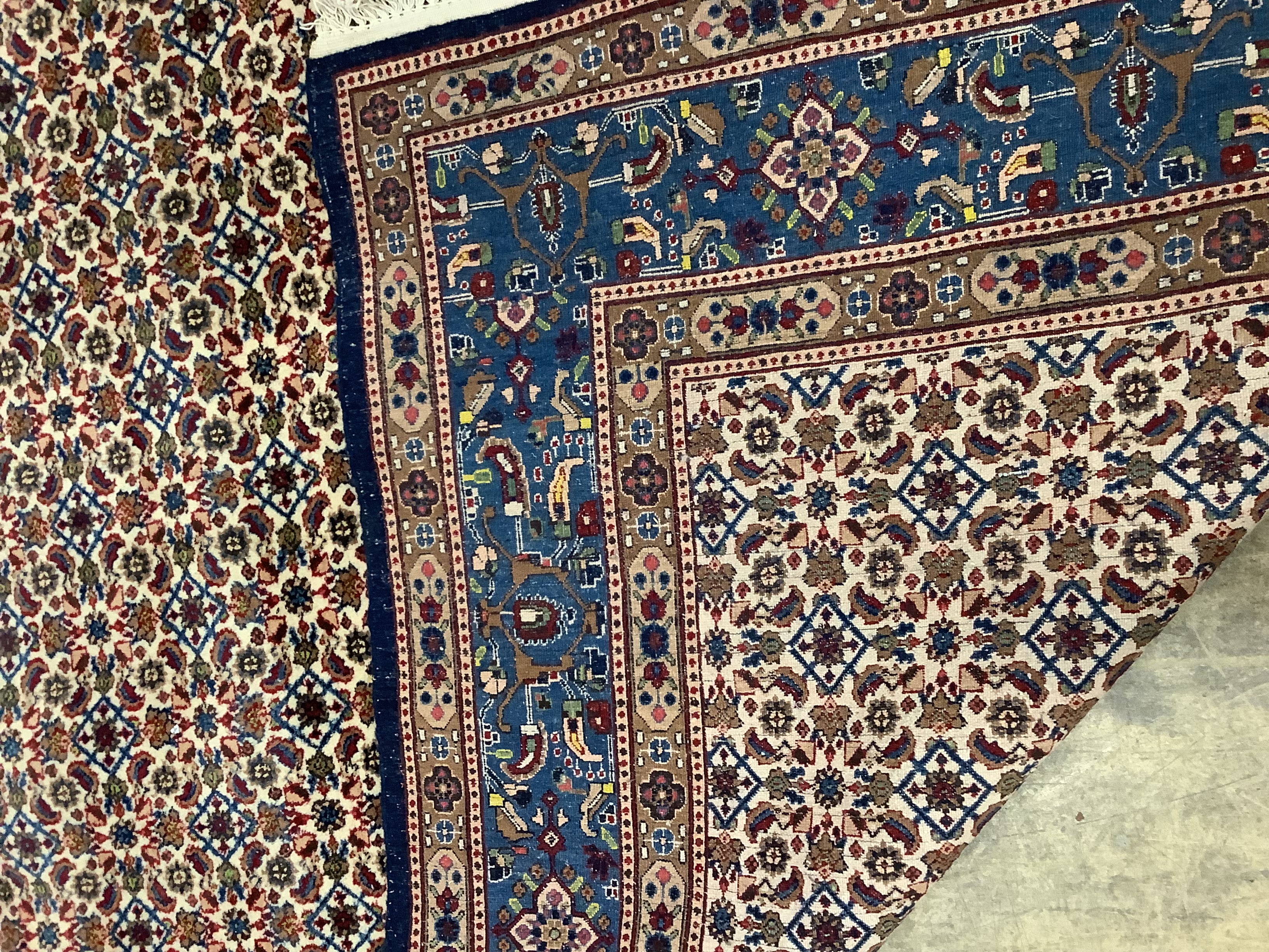 A North West Persian ivory ground carpet, 275 x 210cm